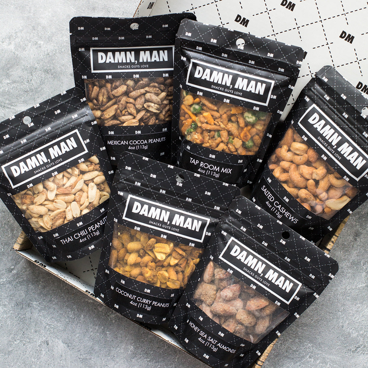 210890-z1.jpg Damn, Man Manly Mixed Gourmet Nut Box - Image 1